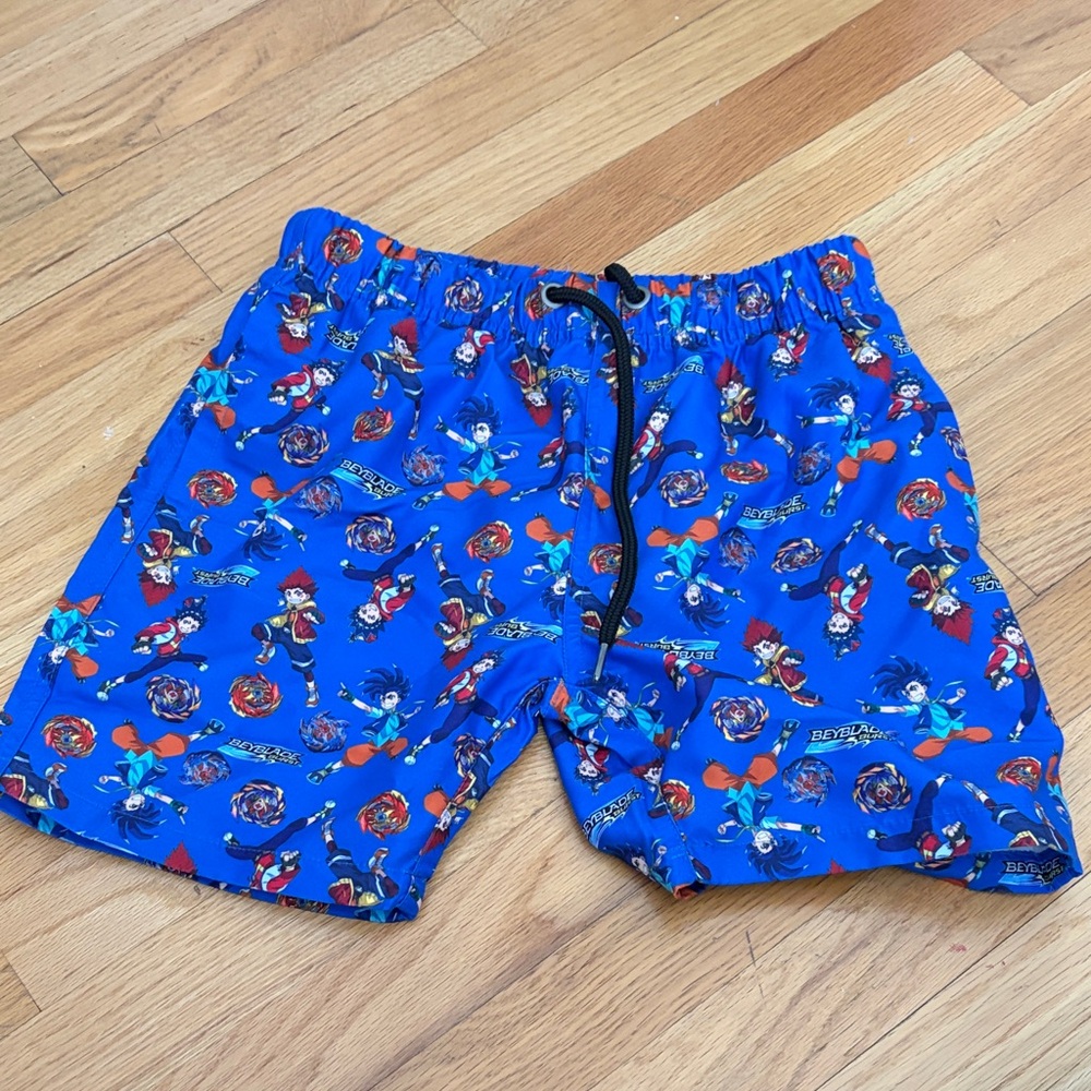 Kids Blue Beyblade Swim Trunks, 6/7